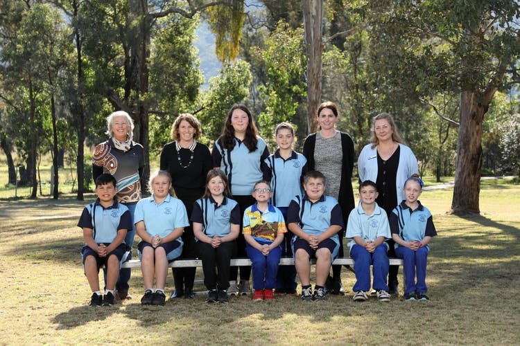 An image of the staff and school leaders.